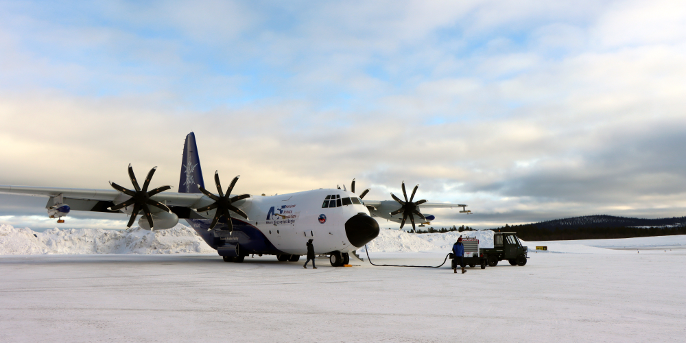 Large aircraft being prepared for its first mission in the Sub-Arctic region.