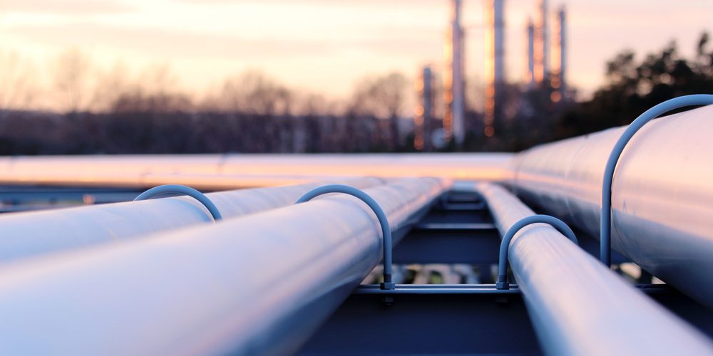 Source: Shutterstock, https://www.shutterstock.com/image-photo/steel-long-pipes-crude-oil-factory-570368662